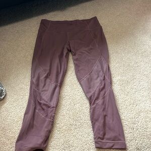 Slightly cropped purple athleta leggins